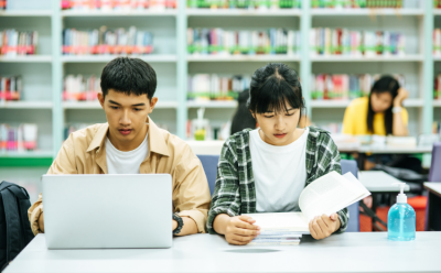 2 Students are studying in the Library.