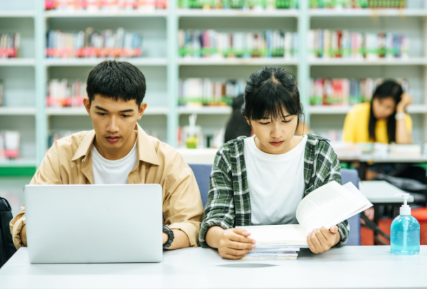 2 Students are studying in the Library.