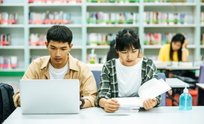 2 Students are studying in the Library.
