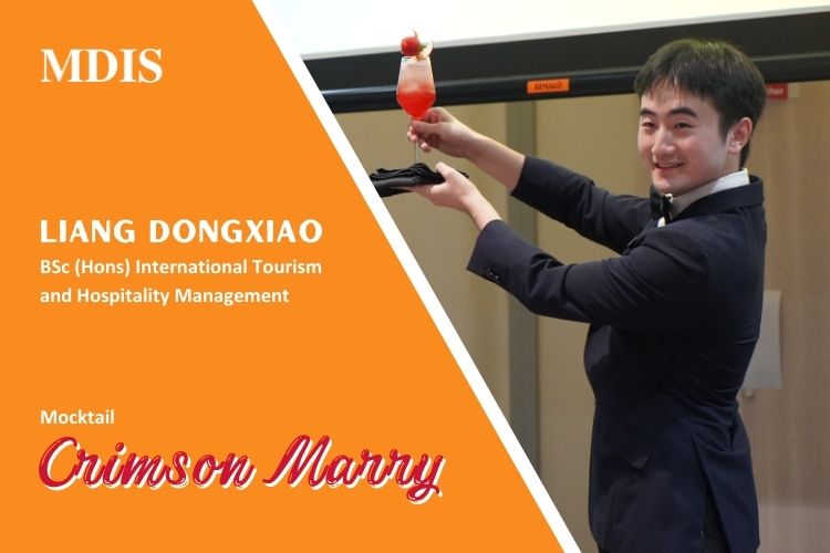 MDIS School of Tourism and Hospitality Student presenting his mocktail to the crowd at the National Mocktail Competition 2023.