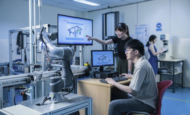 MDIS Students utilising computer software to engineer a device.