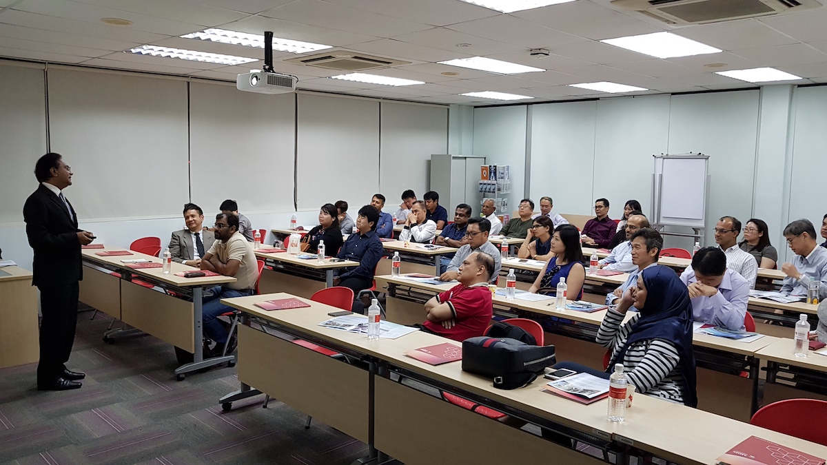 A professor from MDIS Business School addressing his class.