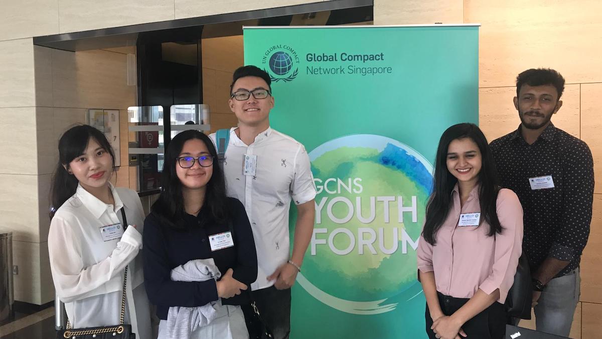 Group of students posing for a picture at the GCNS Youth Forum.