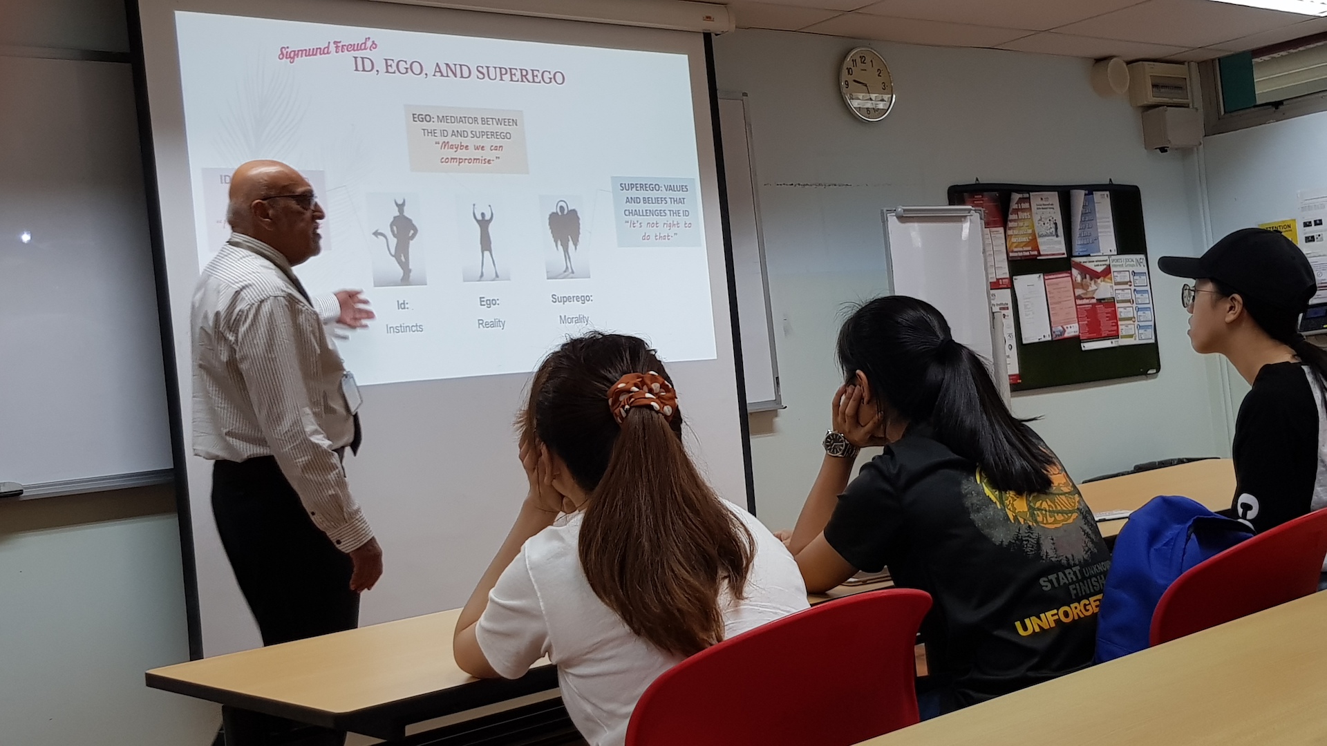 MDIS college lecturer teaching students about psychology.