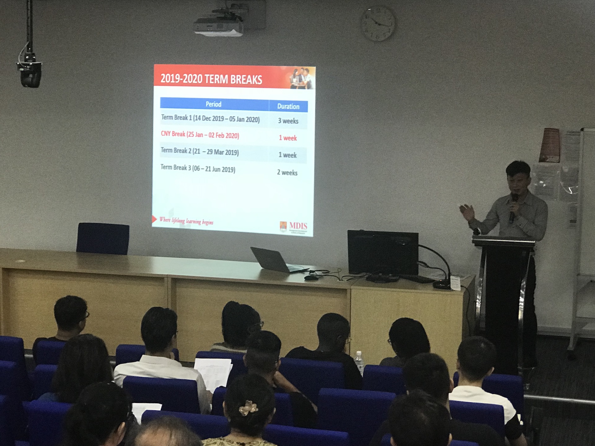 MDIS college lecturer sharing with students about the academic calendar.