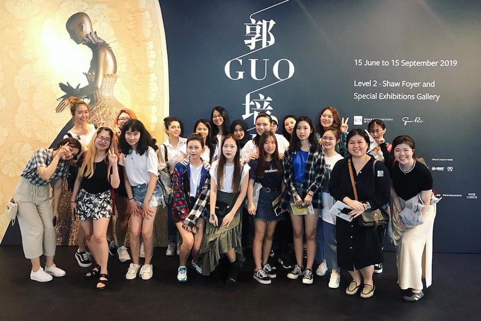 MDIS fashion students at the special exhibitions gallery posing for a picture.