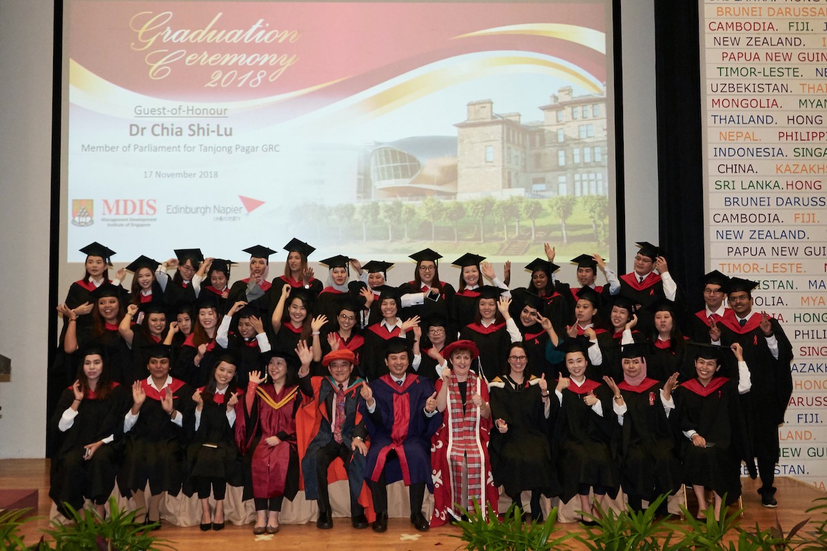 MDIS Nursing students posing during their graduation ceremony.