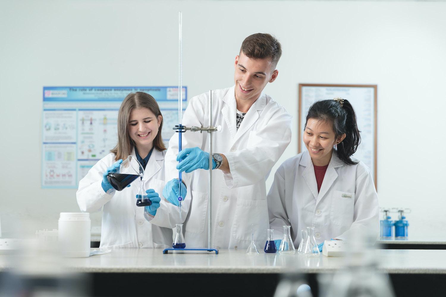 A group of life science students doing some lab work in the laboratory.