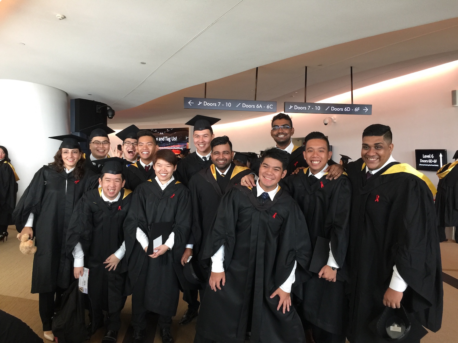 A group of graduates from the School of Engineering posing for a picture.