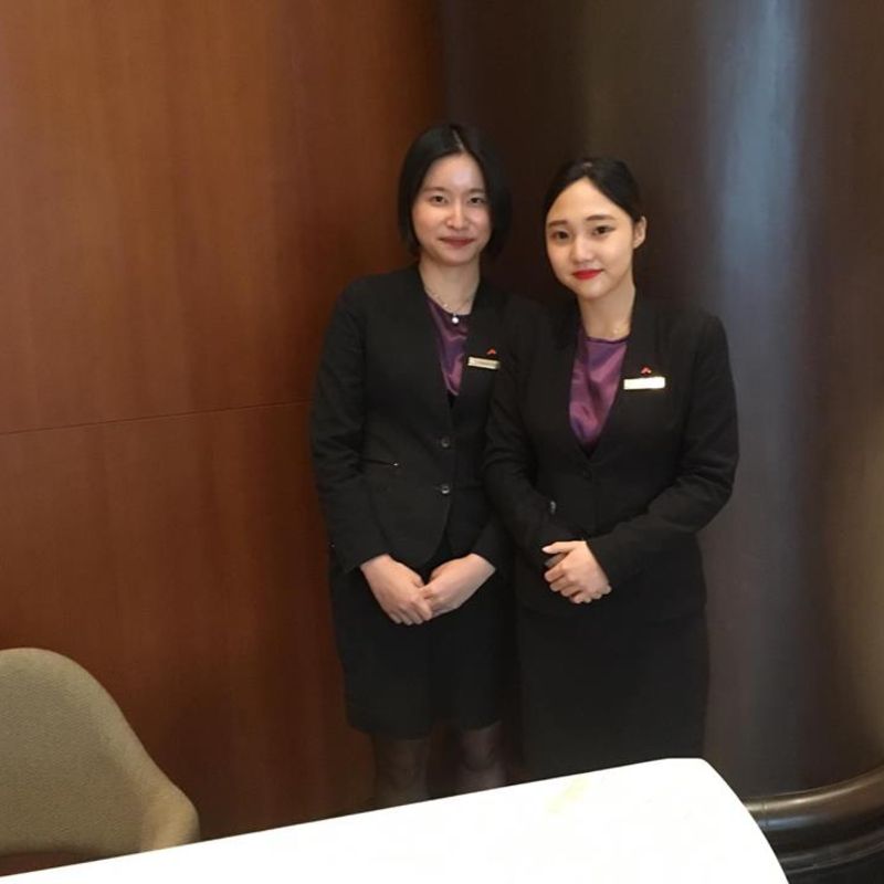 Students pose for picture during hotel internship.